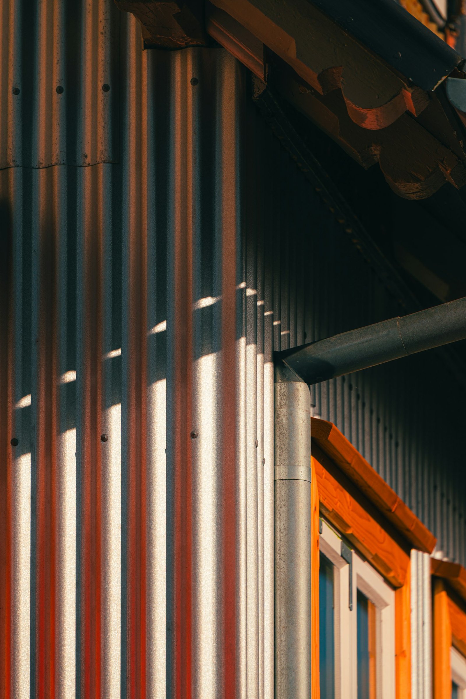 Corrugated steel privacy panel with fasteners and rails